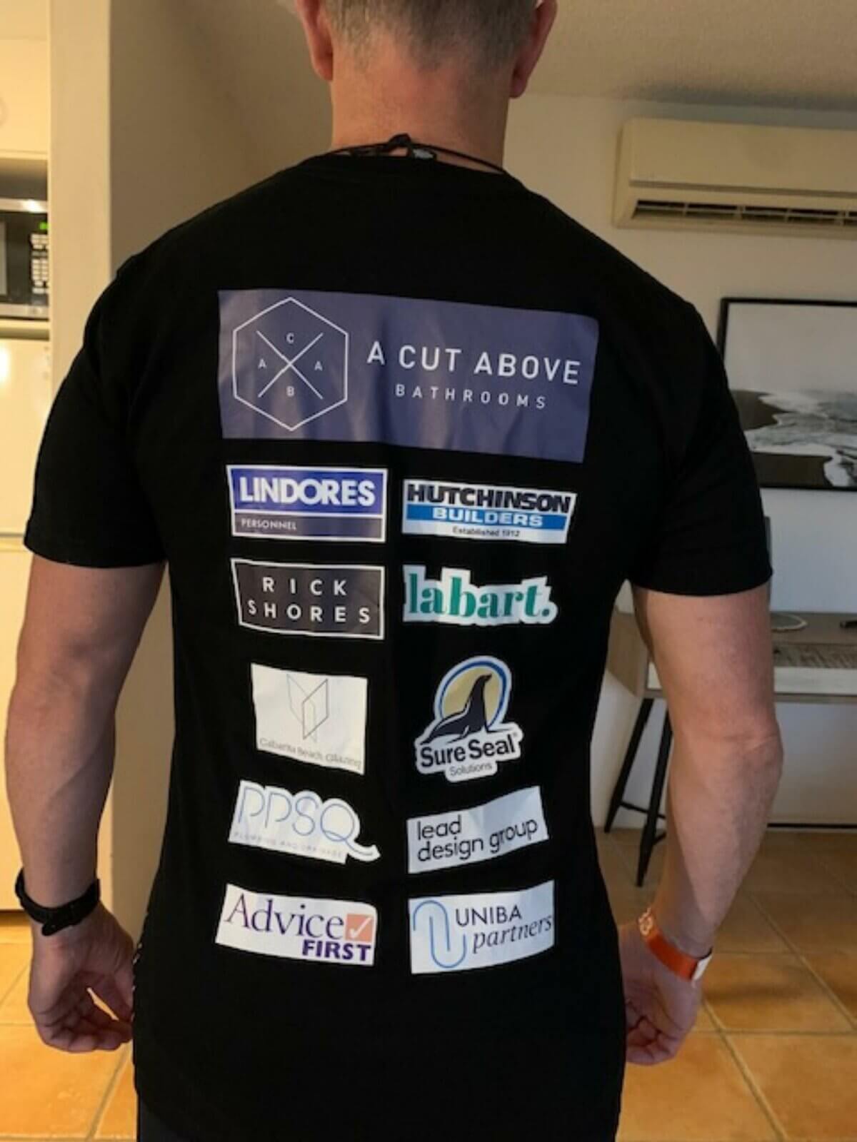 shot of Travis Bailey's t-shirt with sponsor logos