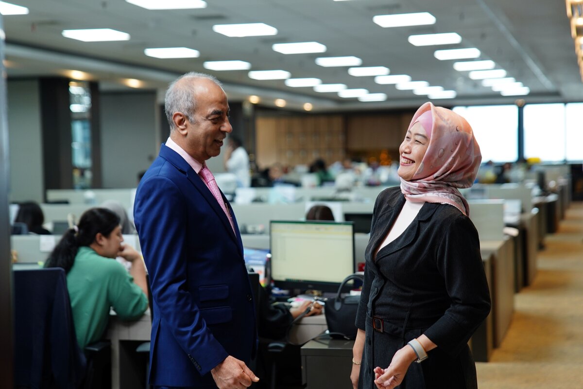 Anil and Missy in their office